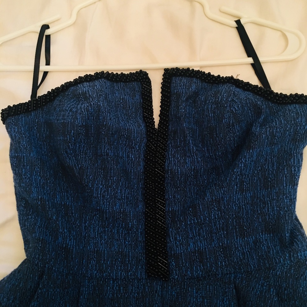 New never worn peplum deep blue top. - Picture 2 of 4